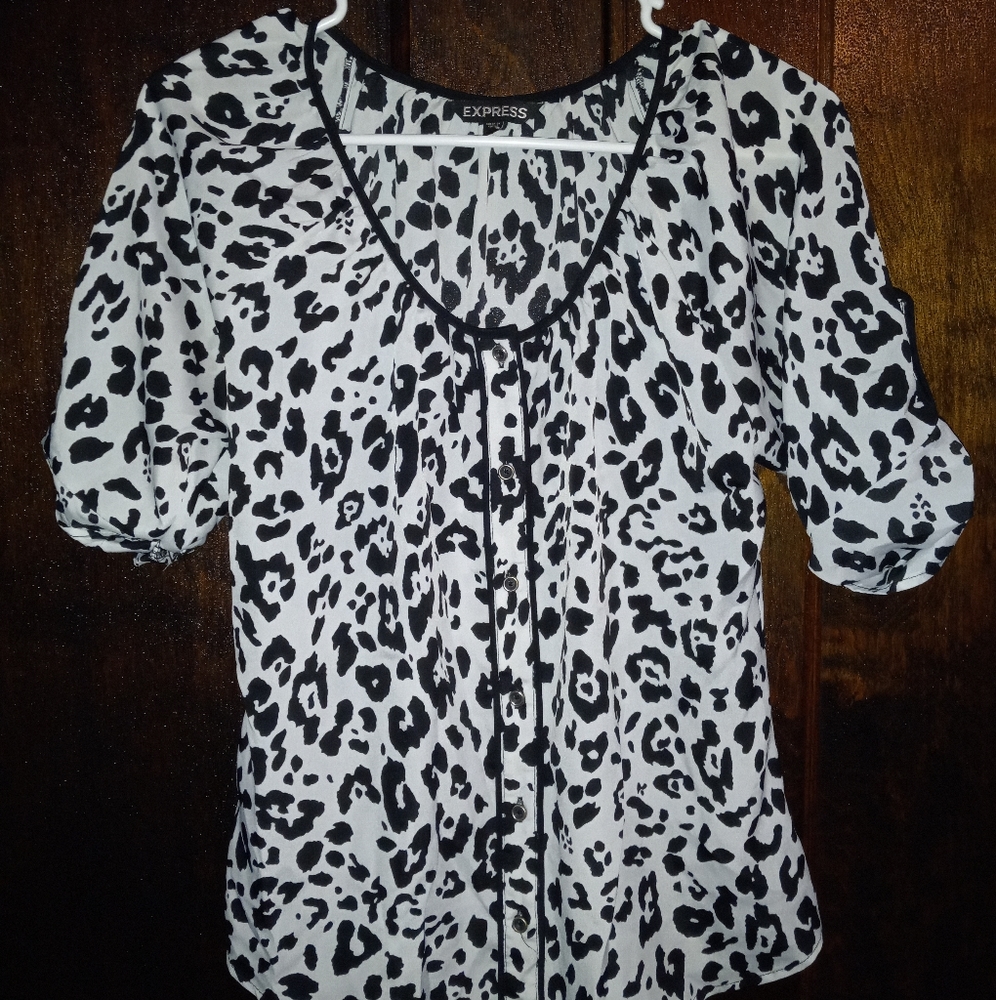 Express: Black and White cheetah print ruffle shirt